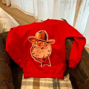 Once owned, from a boutique, Christmas cowboy sweater, like new.